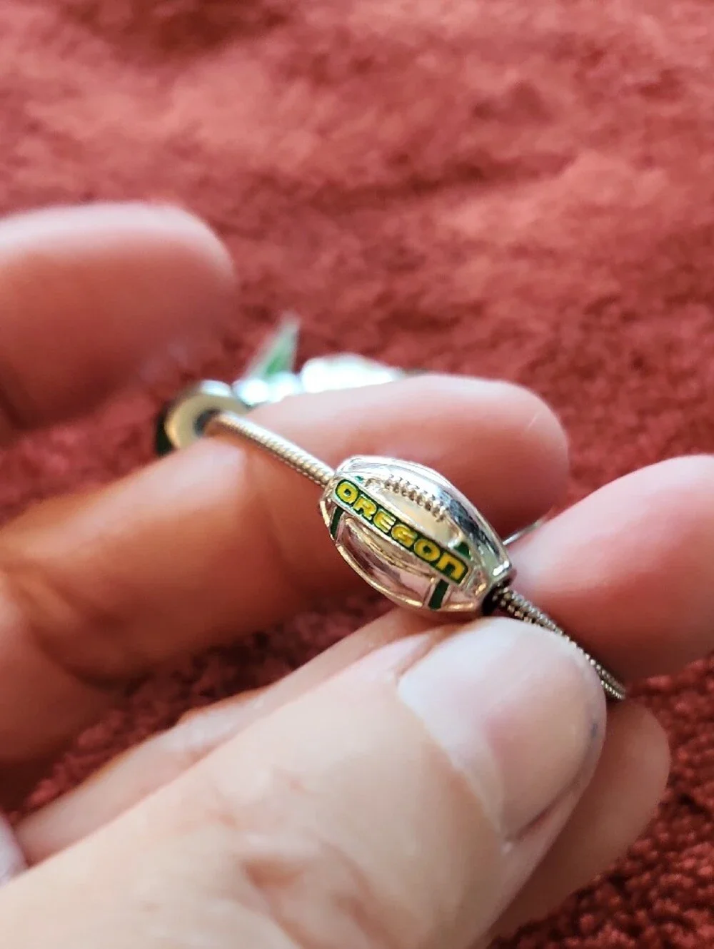 Silver Color Charm Bracelet with Green Beads and Sports Accents